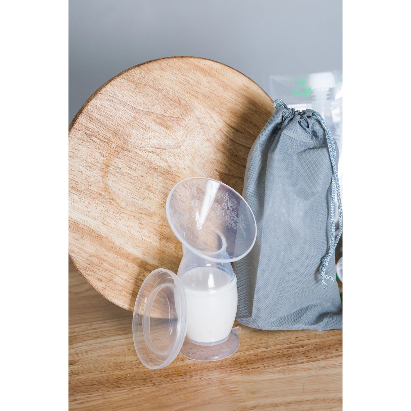 Tiny Tot Innovations | Silicone Breast Milk Collector with Bag